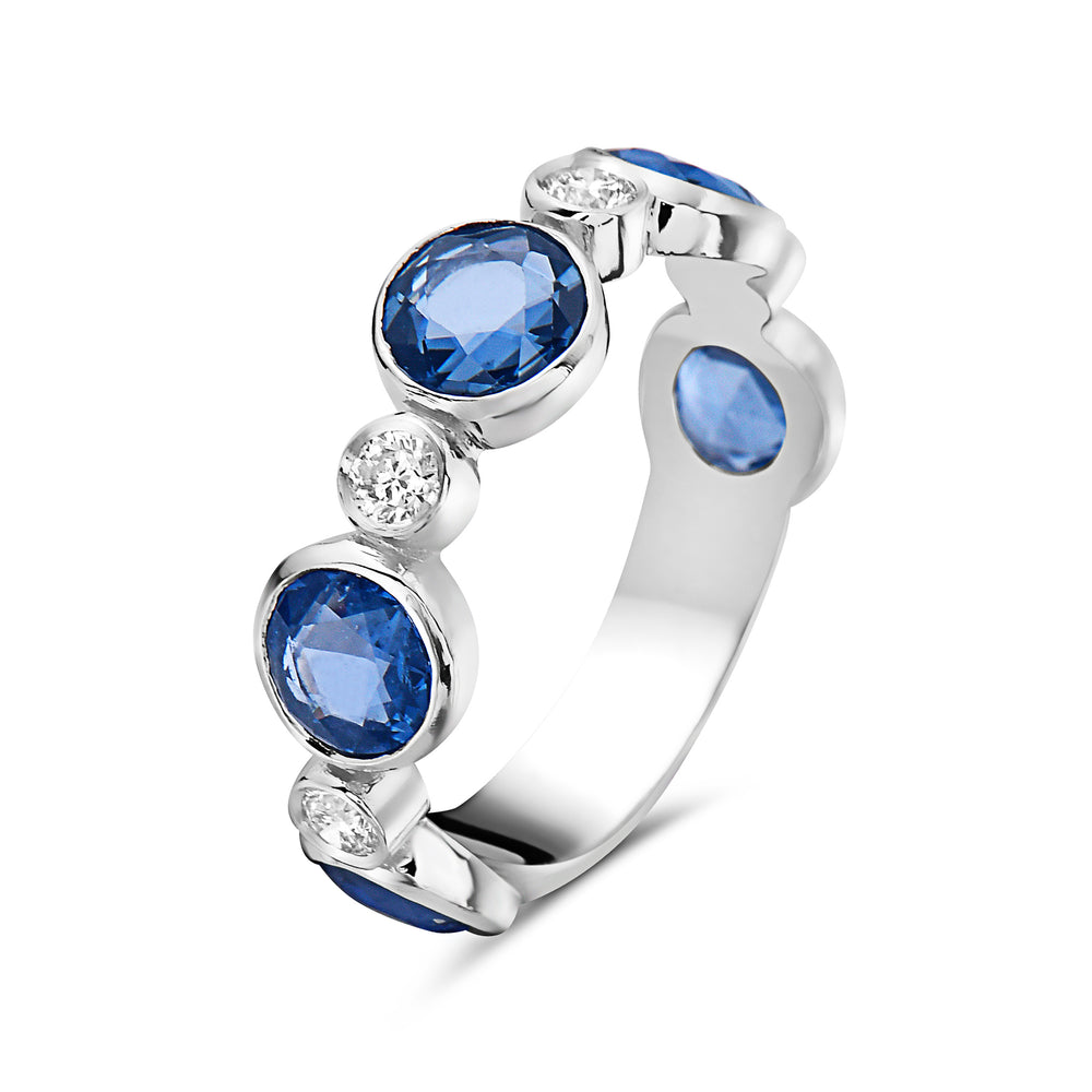 14Kt gold, diamond and blue sapphire ring