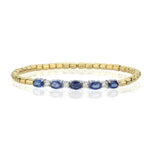 14Kt gold diamond and blue sapphire slip on bangle/bracelet