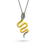 24kt high carat gold and silver, diamond and blue diamond snake pendant