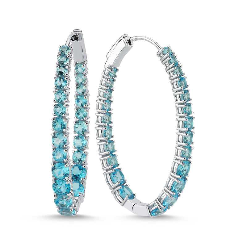 
            
                Load image into Gallery viewer, 14Kt gold and blue topaz inside out oval hoop earrings
            
        