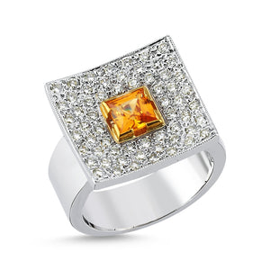 18Kt gold, diamond and orange spestite cocktail ring