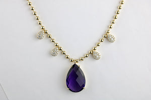 14Kt gold diamond and amethyst necklace