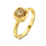 24Kt gold and yellow sapphire ring